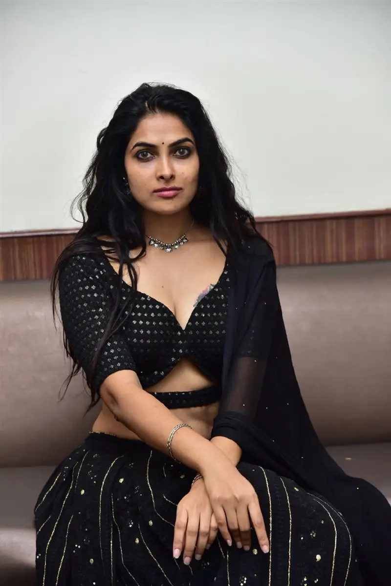 Divi Vadthya super poses in Black Dress at ATM Series Promotional Event
