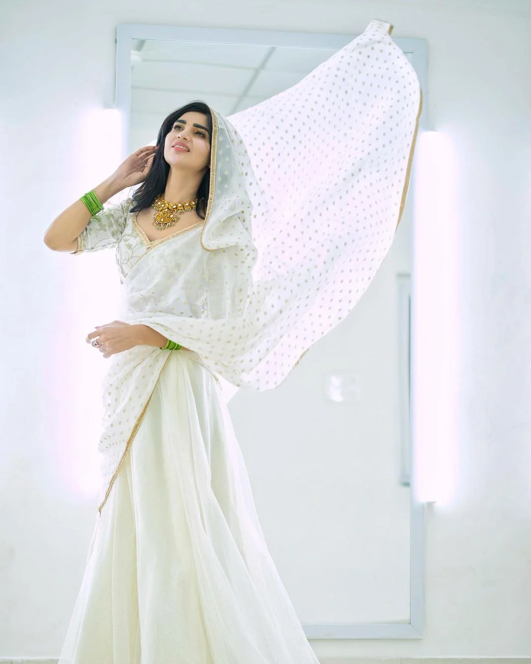 Jabardasth Varsha fabulous looks in white saree..