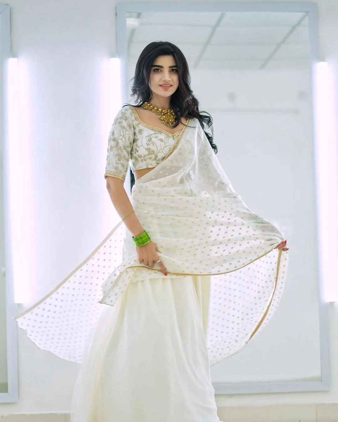 Jabardasth Varsha fabulous looks in white saree..