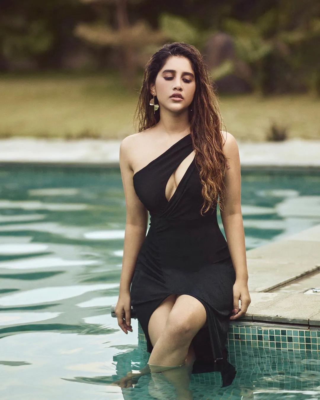 Nabha Natesh heat up the internet with her swimming pool Photos